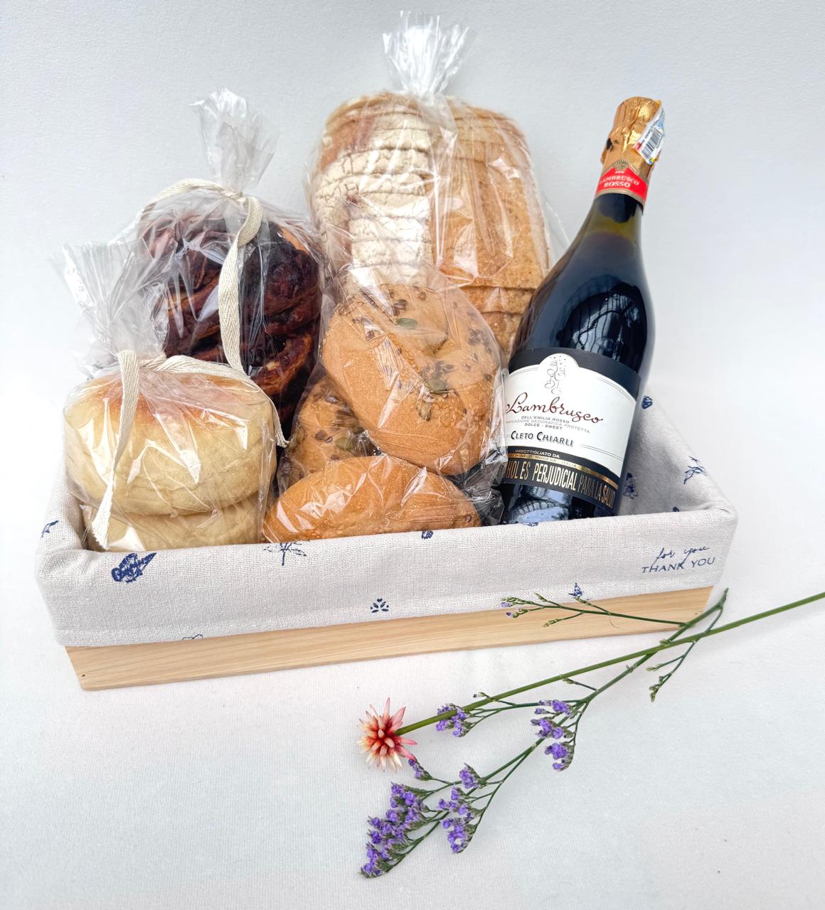 Ancheta con panes y vino