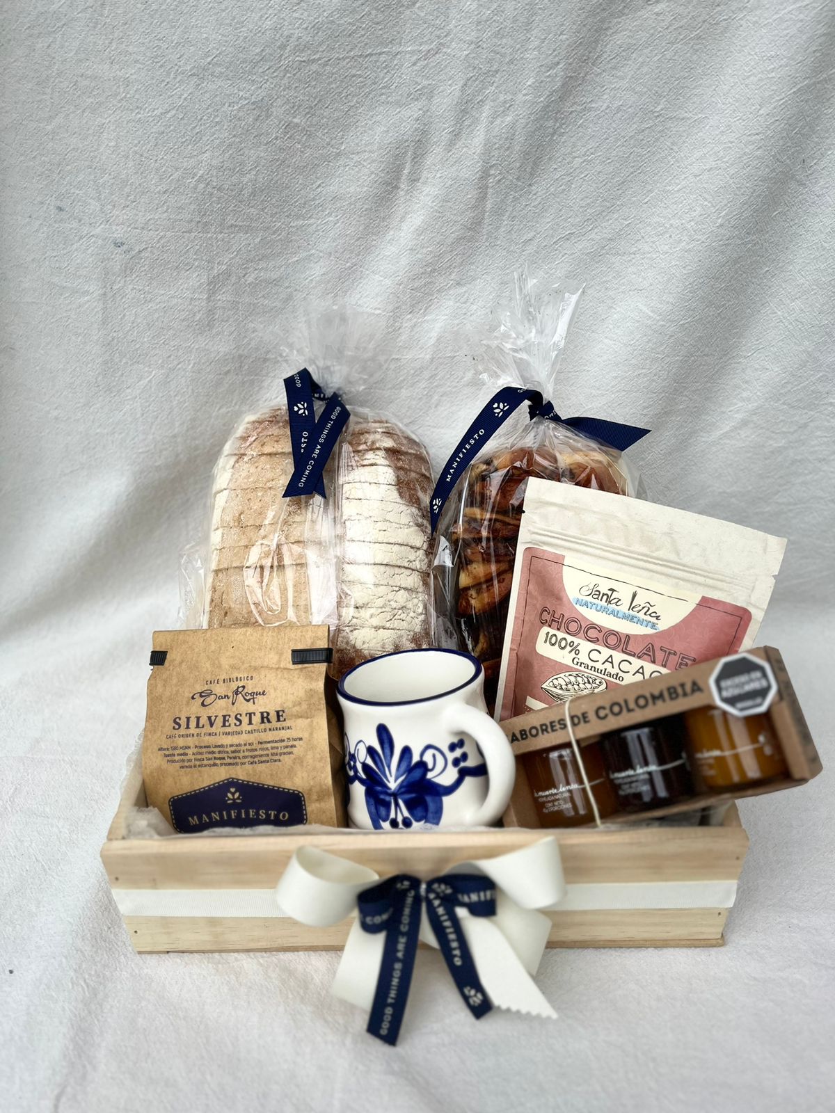 Un algo delicioso-  panes, café artesanal, conservas, mug y chocolate
